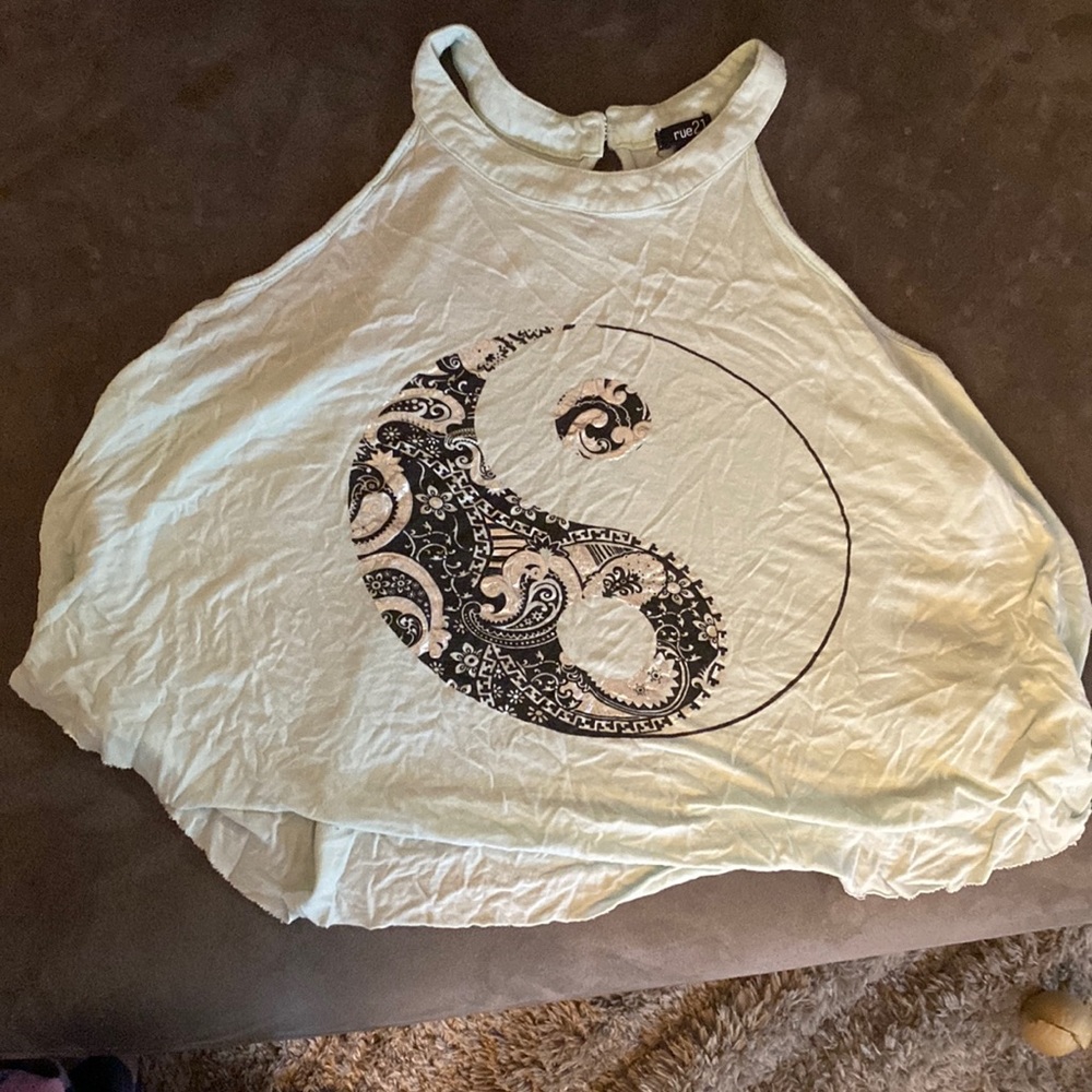 Rue 21 crop top, size large. Young yang symbol. Very pale blue.